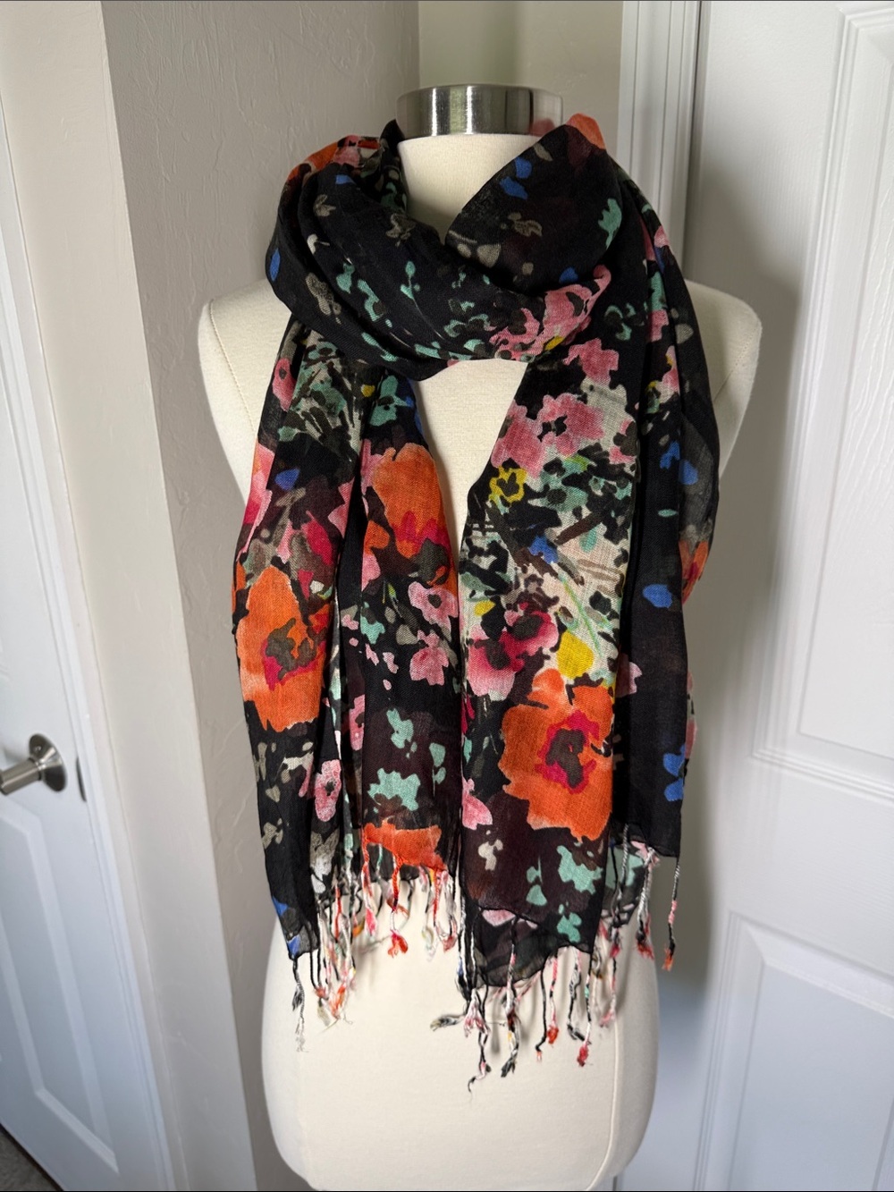 Floral scarf with fringe black background with vibrant print